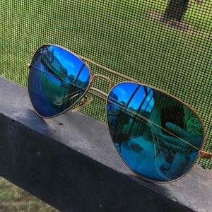 Blue mirrored aviator sunglasses